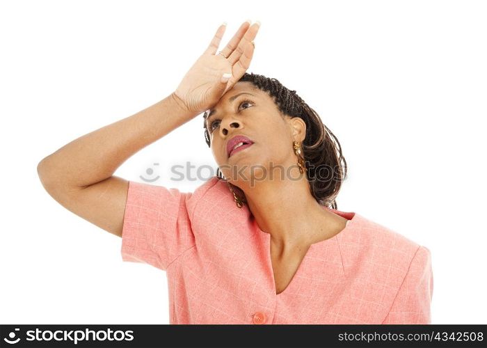 Beautiful African-American businesswoman in despair. Isolated on white.