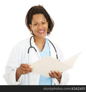 Beautiful african-american female doctor reading a patient&rsquo;s medical chart. Isolated on white.
