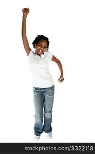 Beautiful African American teen girl dancing to digital music player over white background.