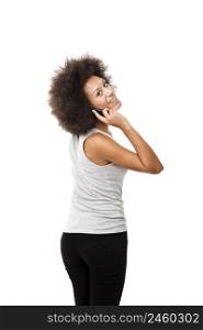 Beautiful African American woman talking on cell phone, isolated on white background