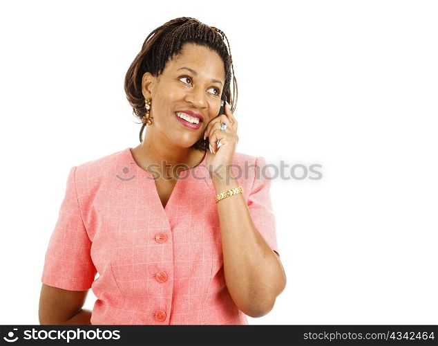 Beautiful african-american woman talking on her cellphone. Isolated on white.