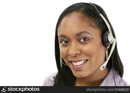 Beautiful African American woman with headset. Shot in studio over white.