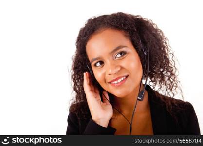 Beautiful african call center woman at work smiling with headset