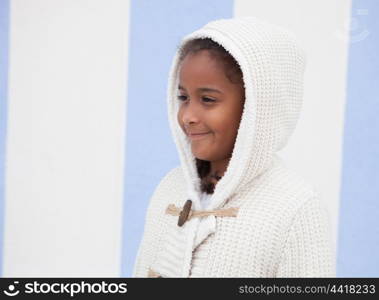 Beautiful african child with blue background outside