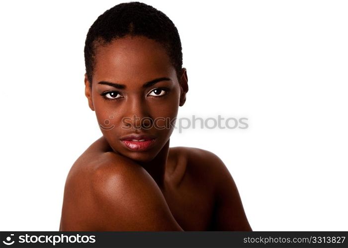 Beautiful African female face with short curly hair looking over shoulder, isolated.