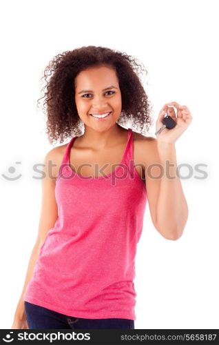 Beautiful african woman holding a car key