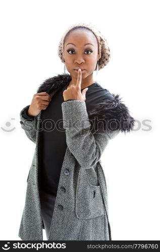 Beautiful African woman wearing gray winter wear, isolated