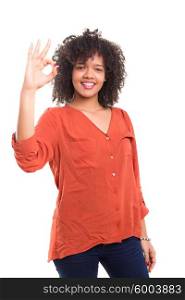 Beautiful african young woman signaling ok, isolated over white