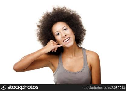 Beautiful Afro-American woman showing the call sign, isolated on white