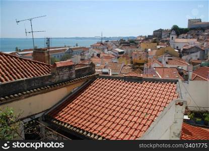 beautiful Alfama downtown view with Tagus river on background in Lisbon, Portugal
