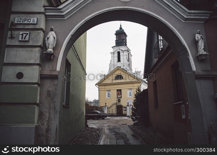 Beautiful ancient ?atholic church in Vilnius. View from arc. Winter season