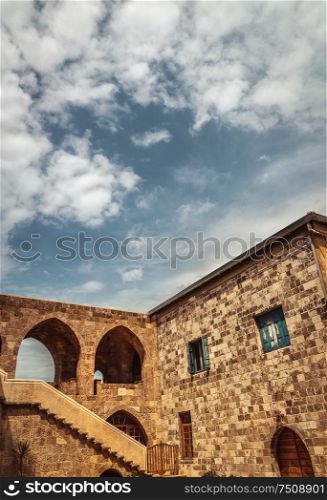 Beautiful ancient monastery over blue sky background, gorgeous architectural structure, old church in Lebanon