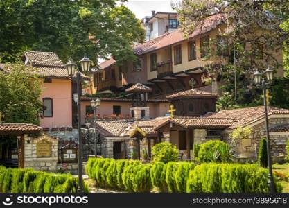 Beautiful ancient monastery with red tiled roofs in Bulgaria
