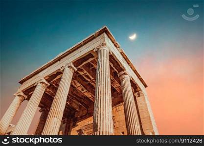 Beautiful ancient temple. High column ruins over colorful sky background with a moon on a side. Scenics destination. Parthenon. Athens. Greece. Europe. Parthenon over night sky background