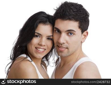 Beautiful and attractive young couple standing over a white background