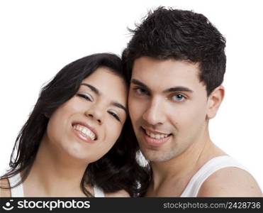 Beautiful and attractive young couple standing over a white background