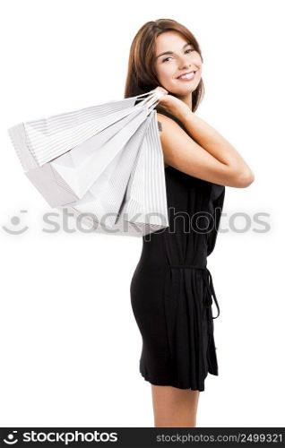 Beautiful and attractive young woman with shopping bags, isolated over white background. Woman Shopping
