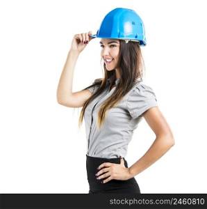 Beautiful and confident young female architect wearing a blue helmet, isolated on white background