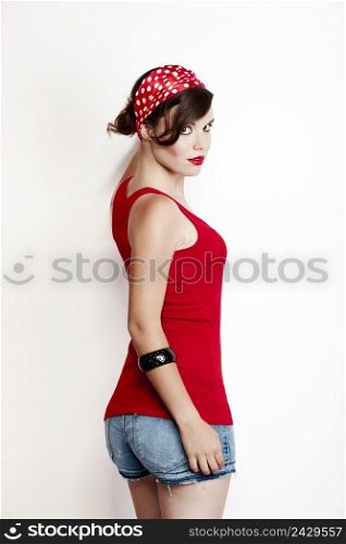 Beautiful and fashion young woman with a pin-up look