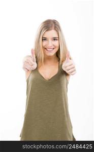 Beautiful and happy blonde woman looking to the camera with thumbs up, isolated over white background