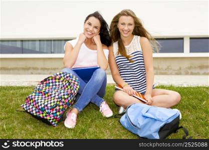 Beautiful and happy teenage students in the school