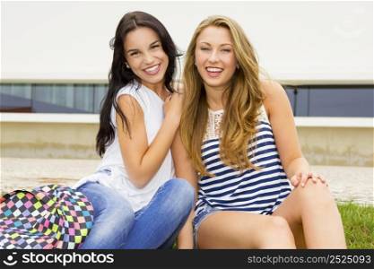 Beautiful and happy teenage students in the school