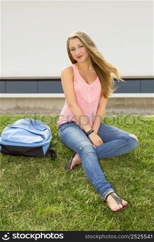 Beautiful and happy teenager student in the school