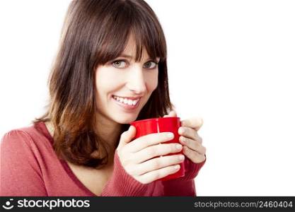 Beautiful and happy woman holding a cup of coffee, isolated on a white background