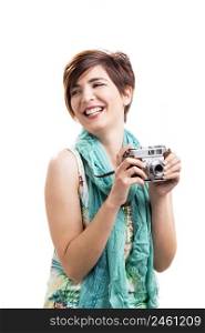 Beautiful and happy woman with a vintage camera, isolated over white background