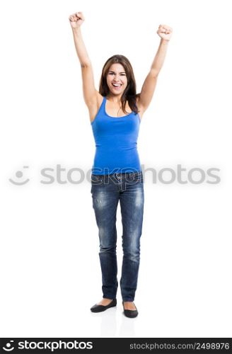 Beautiful and happy woman with arms up, isolated over a white background