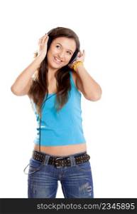Beautiful and happy young girl listen music with headphones, isolated on white