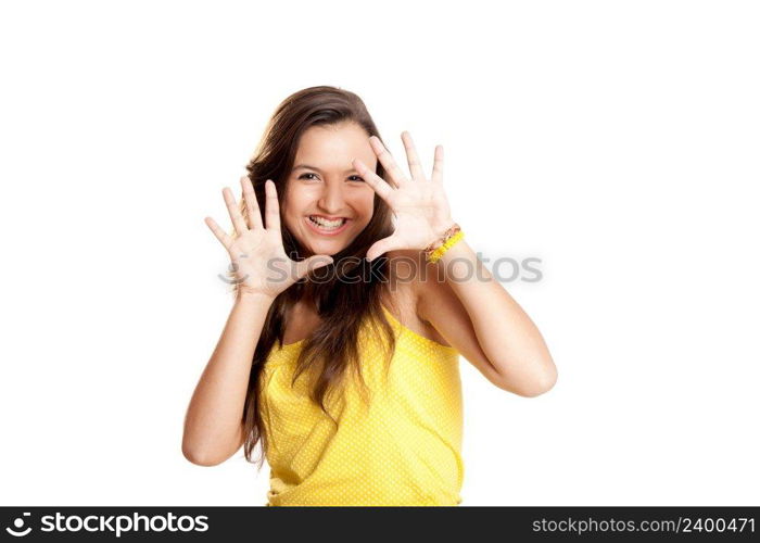 Beautiful and happy young girl with both hands on the air, isolated on white 