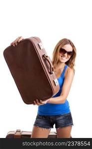 Beautiful and happy  young woman holding an old leather suitcases - isolated on white