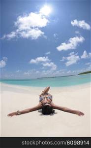 beautiful and happy young woman on beach have fun and relax on summer vacation over the crystal clear sea