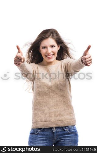 Beautiful and happy young woman with thumbs up, isolated over white background