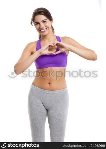 Beautiful and healthy woman making a hearth with her hands, isolated over white background