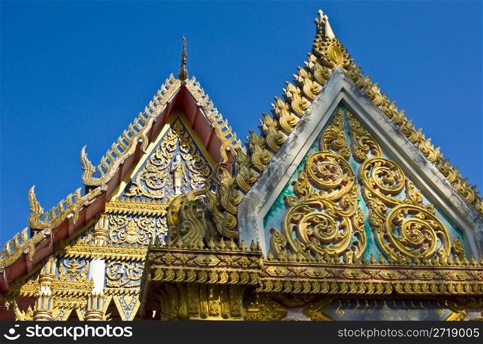 beautiful and ornate gable of a temple in Thailand