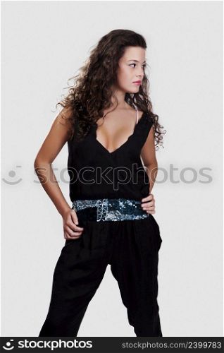 Beautiful and sexy fashion model isolated over a grey background