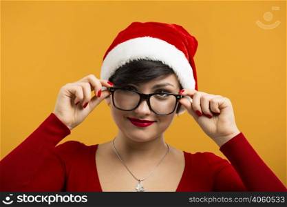 Beautiful and sexy girl wearing santa clause hat