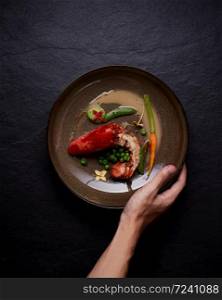 Beautiful and tasty food on a plate, exquisite dish, creative restaurant meal concept