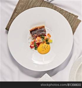 Beautiful and tasty food on a plate, exquisite dish, creative restaurant meal concept . Beautiful and tasty food on a plate