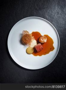 Beautiful and tasty food on a plate, exquisite dish, creative restaurant meal concept 