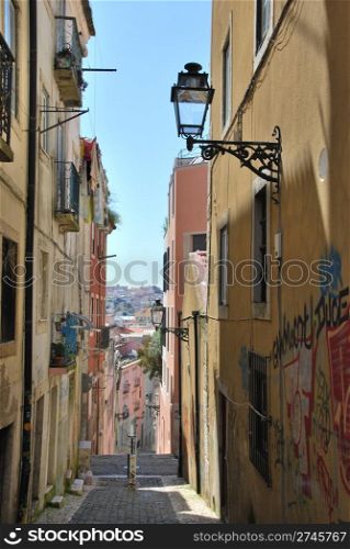 beautiful and traditional view of antique building and lamp in Lisbon, Portugal (river tagus background)