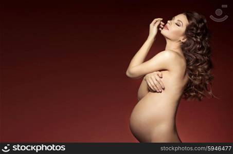 Beautiful and young pregnant mother