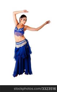 Beautiful Arabic belly dancer harem woman in blue with silver dress and head jewelry with gem dancing swirling her arms, isolated.