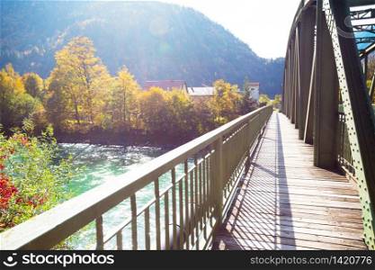 beautiful arched metal bridge in a small Austrian town