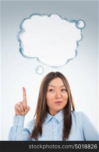 Beautiful asian business woman have good idea, including thought bubble with copy space on grey background