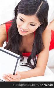 Beautiful Asian Chinese Woman Using Tablet Computer
