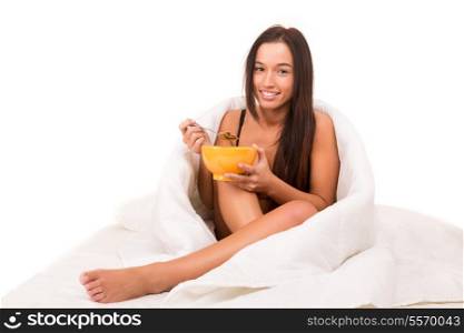 Beautiful asian woman having breakfast in bed
