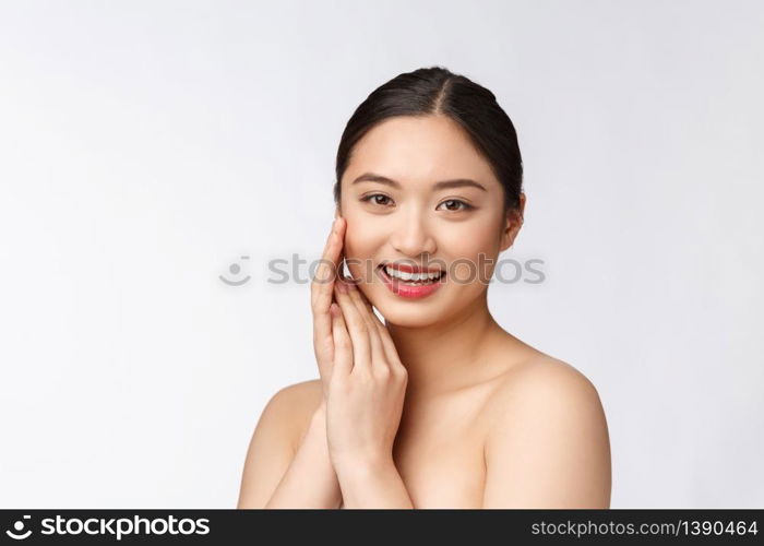 Beautiful asian woman makeup of cosmetic, girl hand touch cheek and smile, face of beauty perfect with wellness isolated on white background. Beautiful asian woman makeup of cosmetic, girl hand touch cheek and smile, face of beauty perfect with wellness isolated on white background.